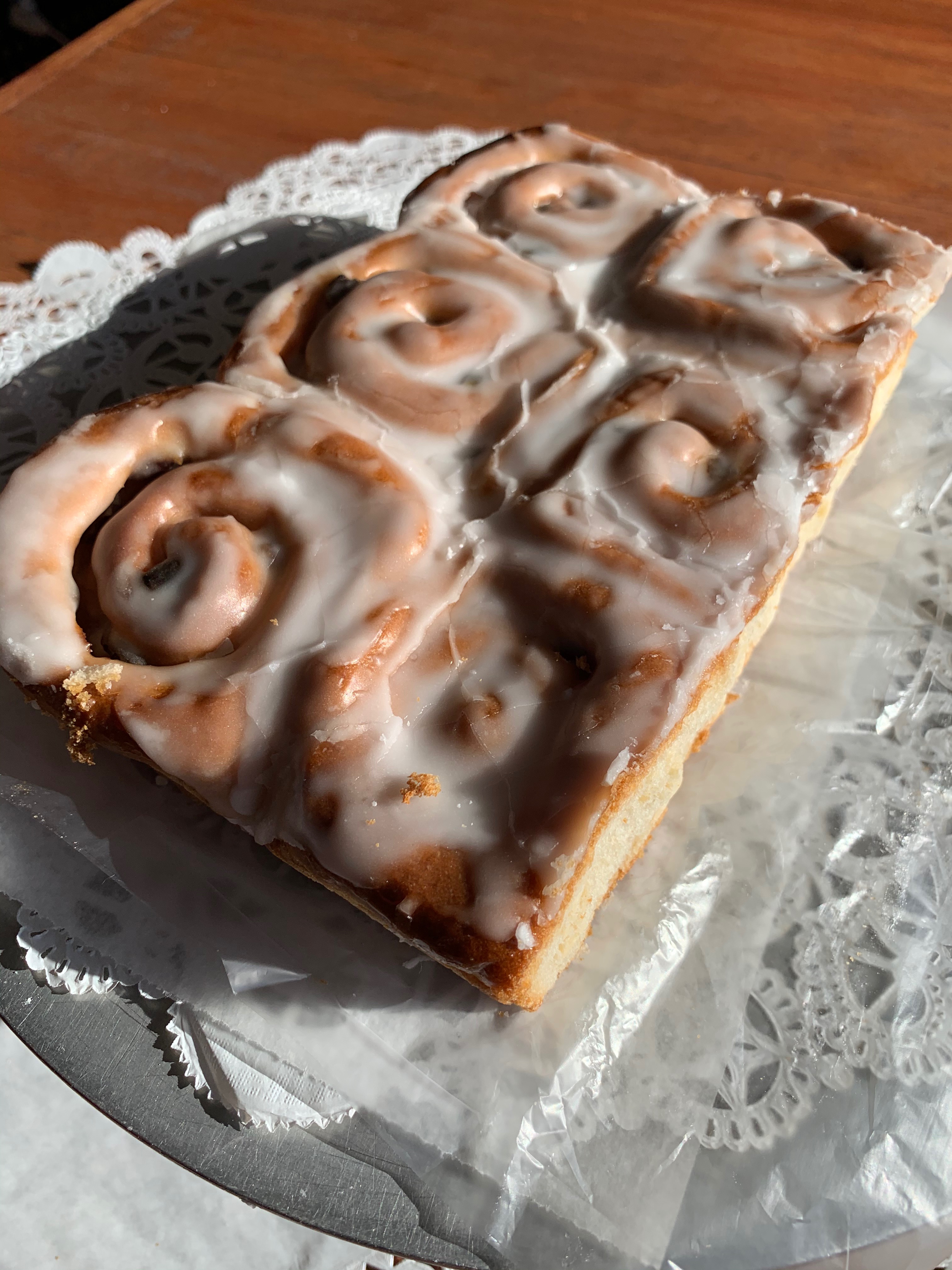 A tray of iced cinnamon buns
